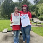 Pam and Laura in Wright Park holding petitions