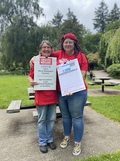 Pam and Laura in Wright Park holding petitions
